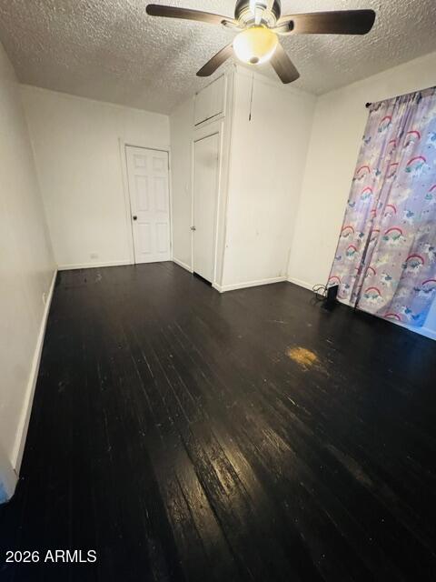 701 6th Green Street Douglas, AZ 85607 - Photo 9 of 10 an empty room with wooden floor