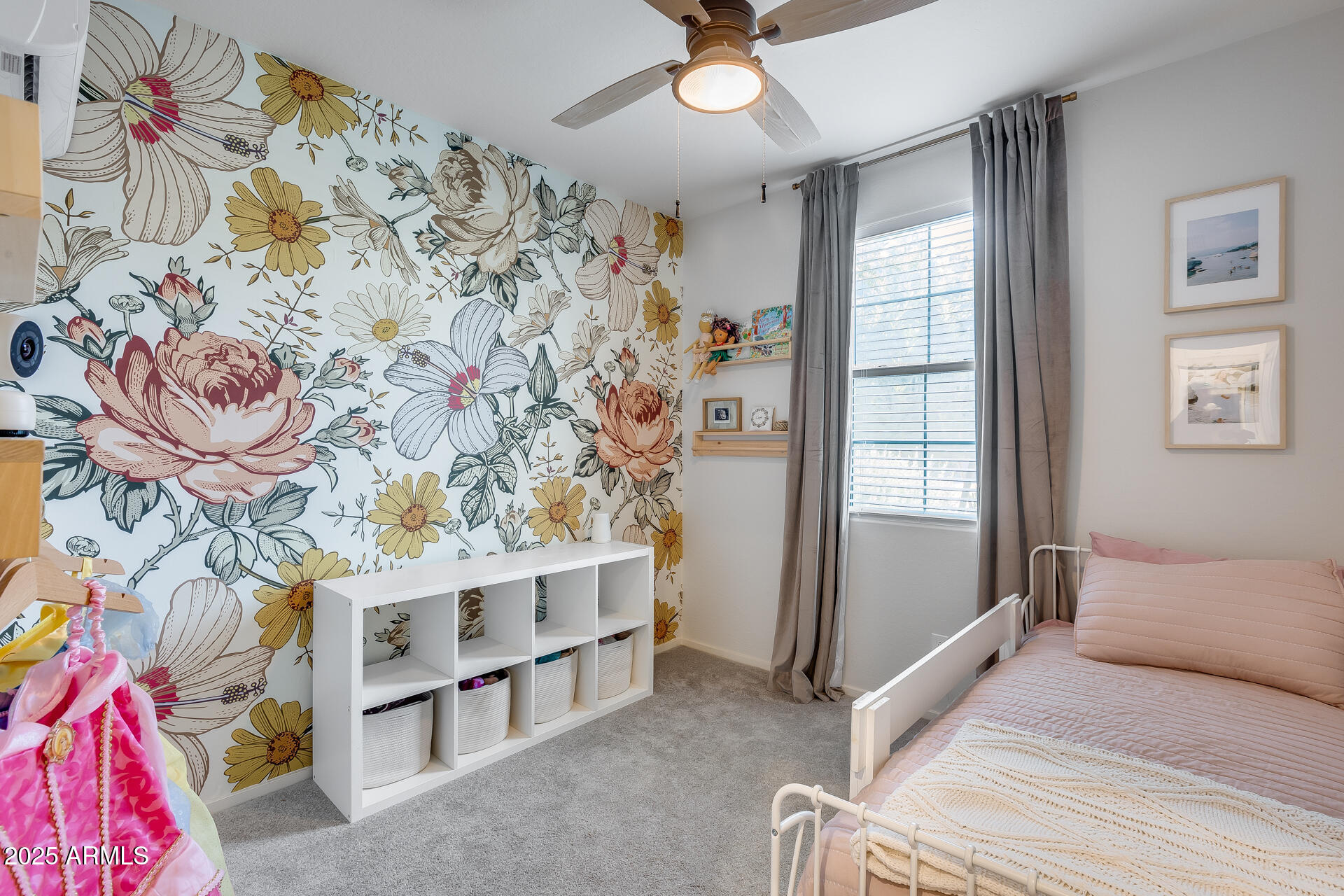 14344 West Hackamore Drive Surprise, AZ 85387 - Photo 10 of 41 a view of bedroom with a bed and a chandelier