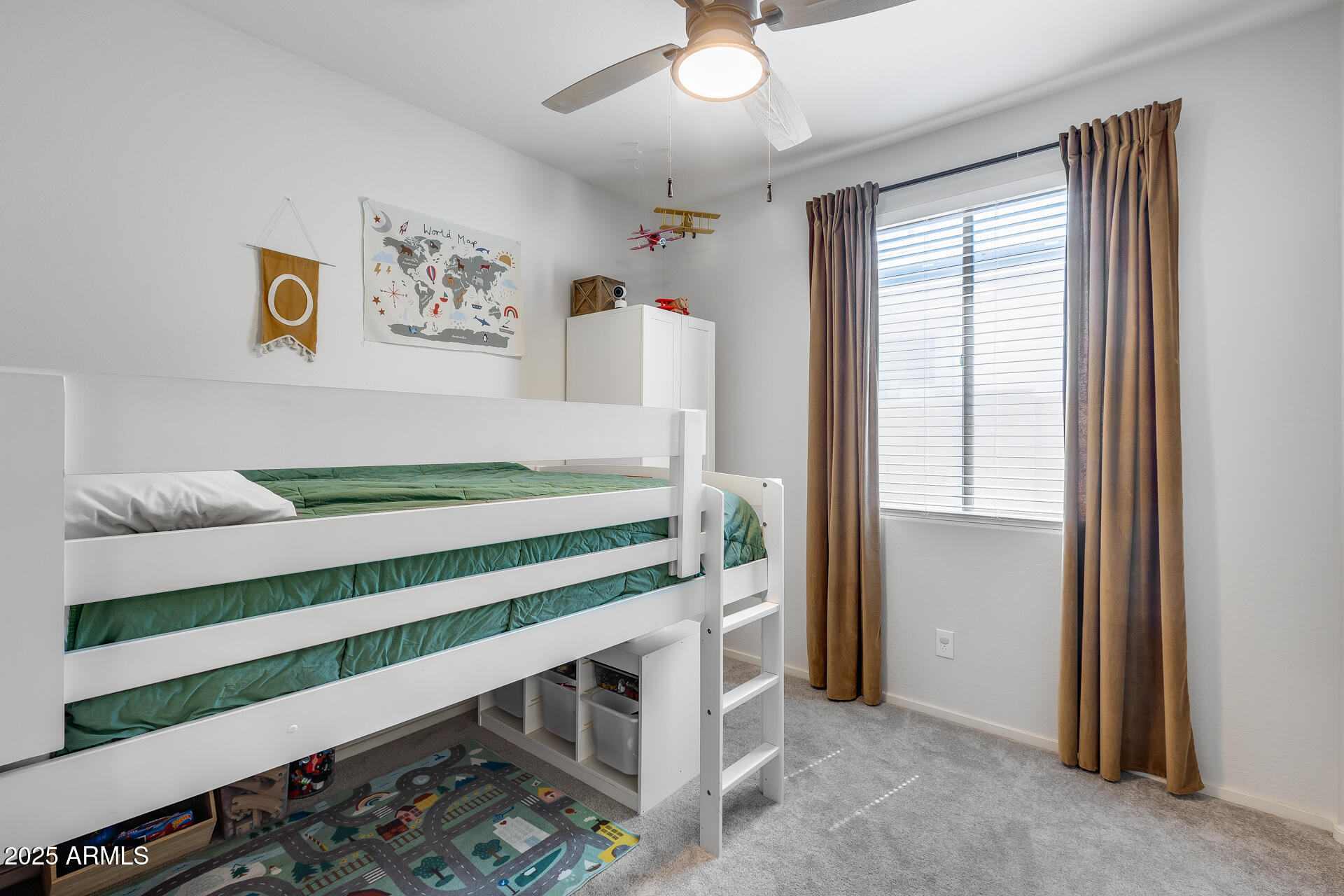 14344 West Hackamore Drive Surprise, AZ 85387 - Photo 15 of 41 a bedroom with a bed and a window