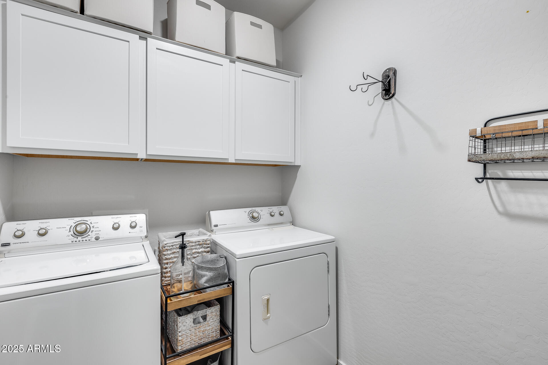 14344 West Hackamore Drive Surprise, AZ 85387 - Photo 18 of 41 a utility room with dryer and washer