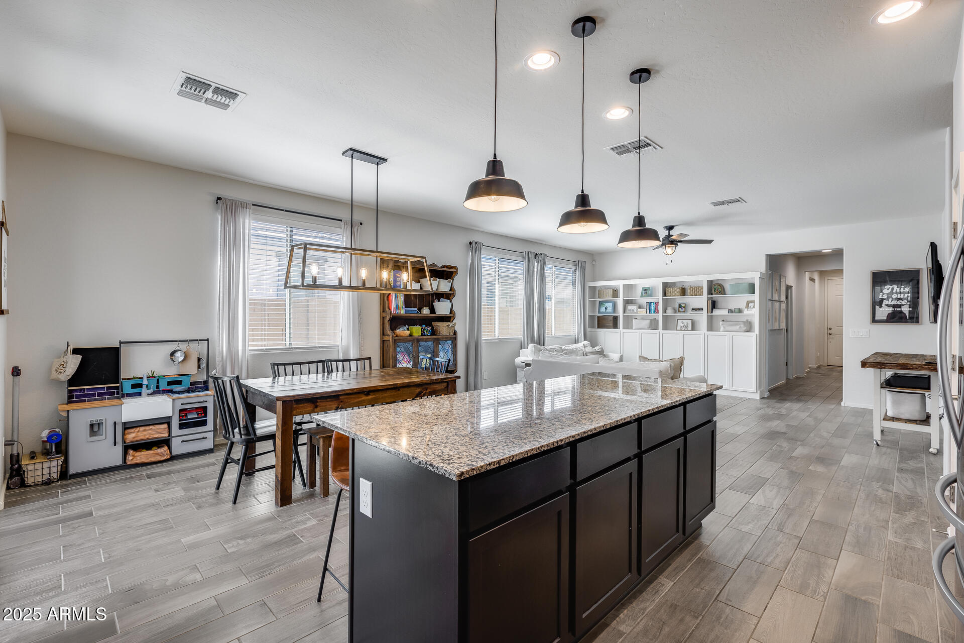 14344 West Hackamore Drive Surprise, AZ 85387 - Photo 27 of 41 a kitchen with lots of counter space