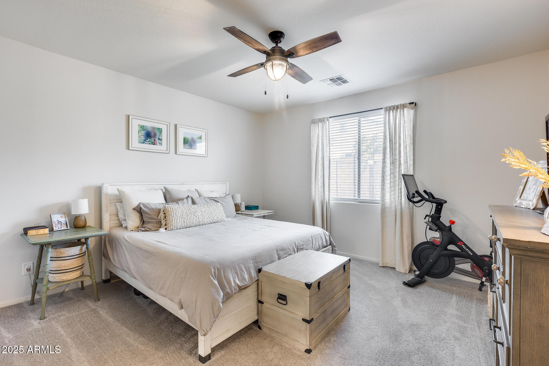 14344 West Hackamore Drive Surprise, AZ 85387 - Photo 31 of 41 a bedroom with a bed and a table