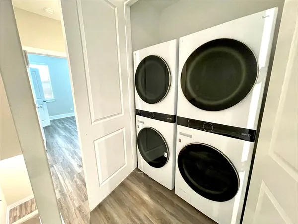 a view of entryway with washer and dryer
