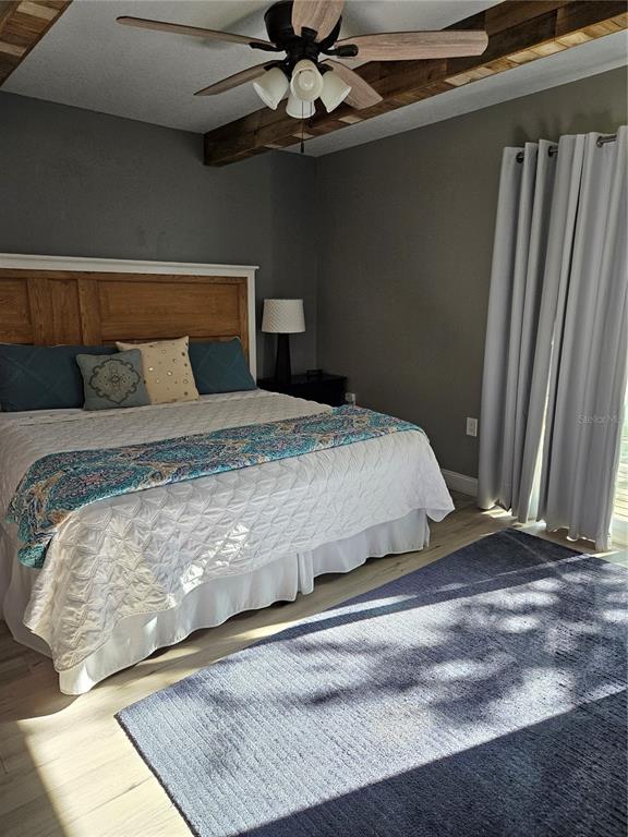 42 Menendez Road St. Augustine, FL 32080 - Photo 16 of 31 a bedroom with a bed and a window