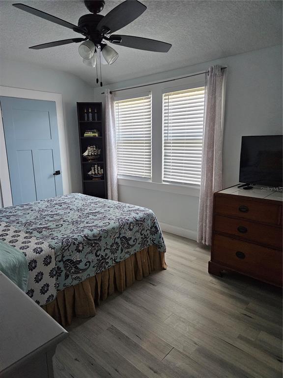 42 Menendez Road St. Augustine, FL 32080 - Photo 20 of 31 a bedroom with a bed and a flat tv screen