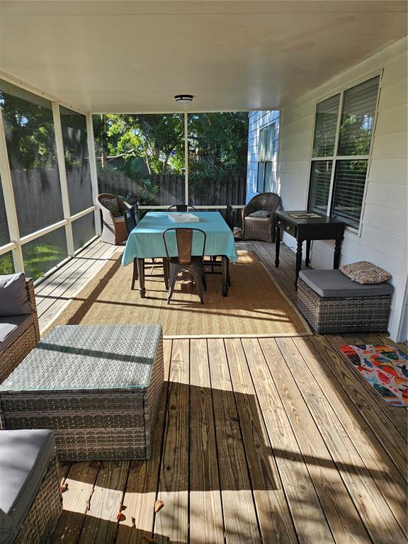 42 Menendez Road St. Augustine, FL 32080 - Photo 24 of 31 a view of sitting area with furniture and floor to ceiling window