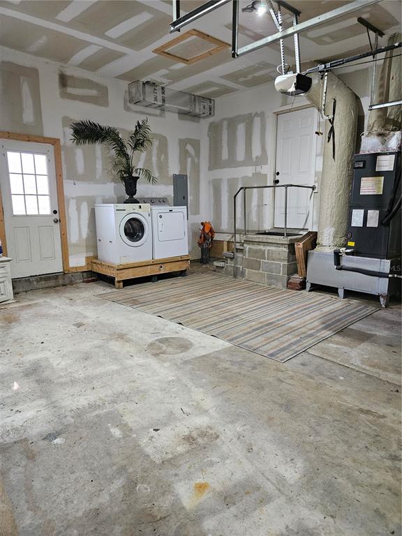 42 Menendez Road St. Augustine, FL 32080 - Photo 30 of 31 a utility room with dryer and washer