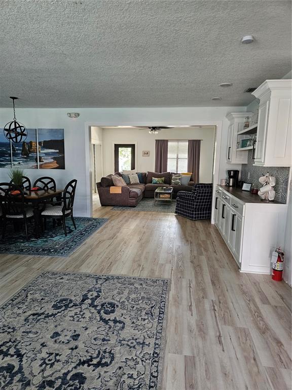 42 Menendez Road St. Augustine, FL 32080 - Photo 3 of 31 a living room with furniture and a couch