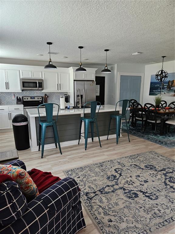 42 Menendez Road St. Augustine, FL 32080 - Photo 5 of 31 a view of a dining area with furniture