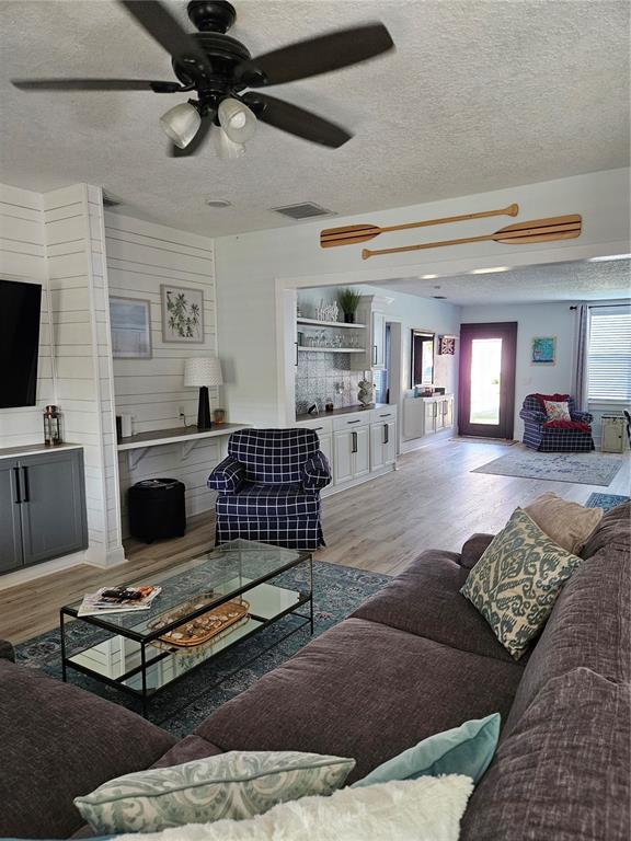 42 Menendez Road St. Augustine, FL 32080 - Photo 10 of 31 a living room with furniture and a rug