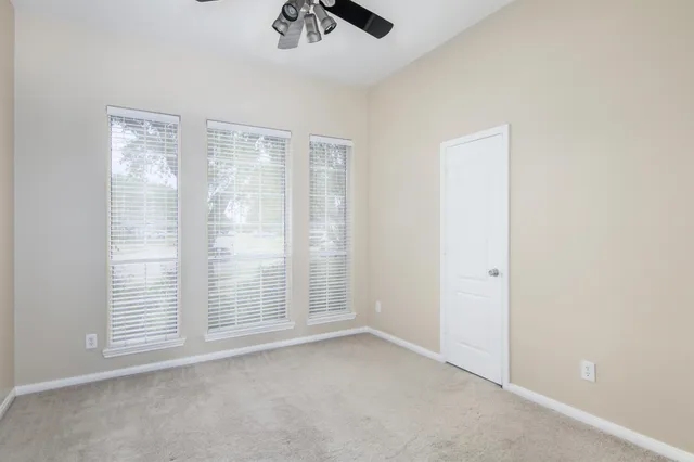 an empty room with windows