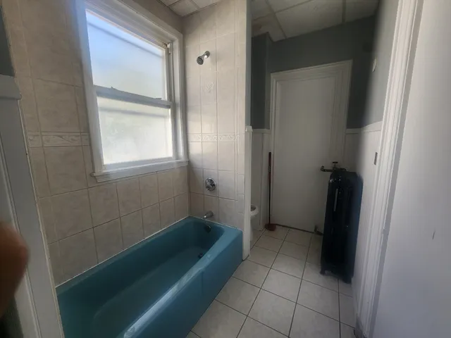 a bathroom with a bathtub