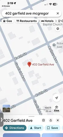 a picture of a book and a white wall