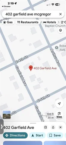 a picture of a book and a white wall