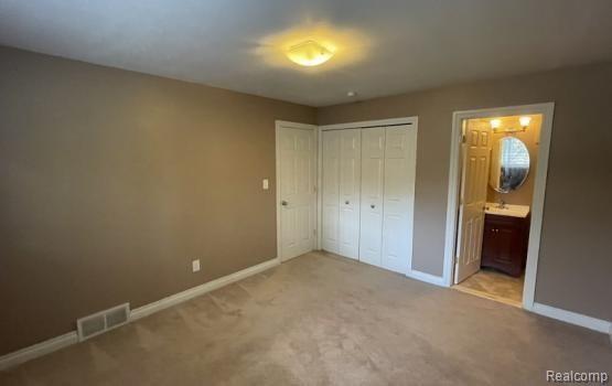 982 North Adams Road, Unit 2 Birmingham, MI 48009 - Photo 12 of 23 Bedroom 3.jpg