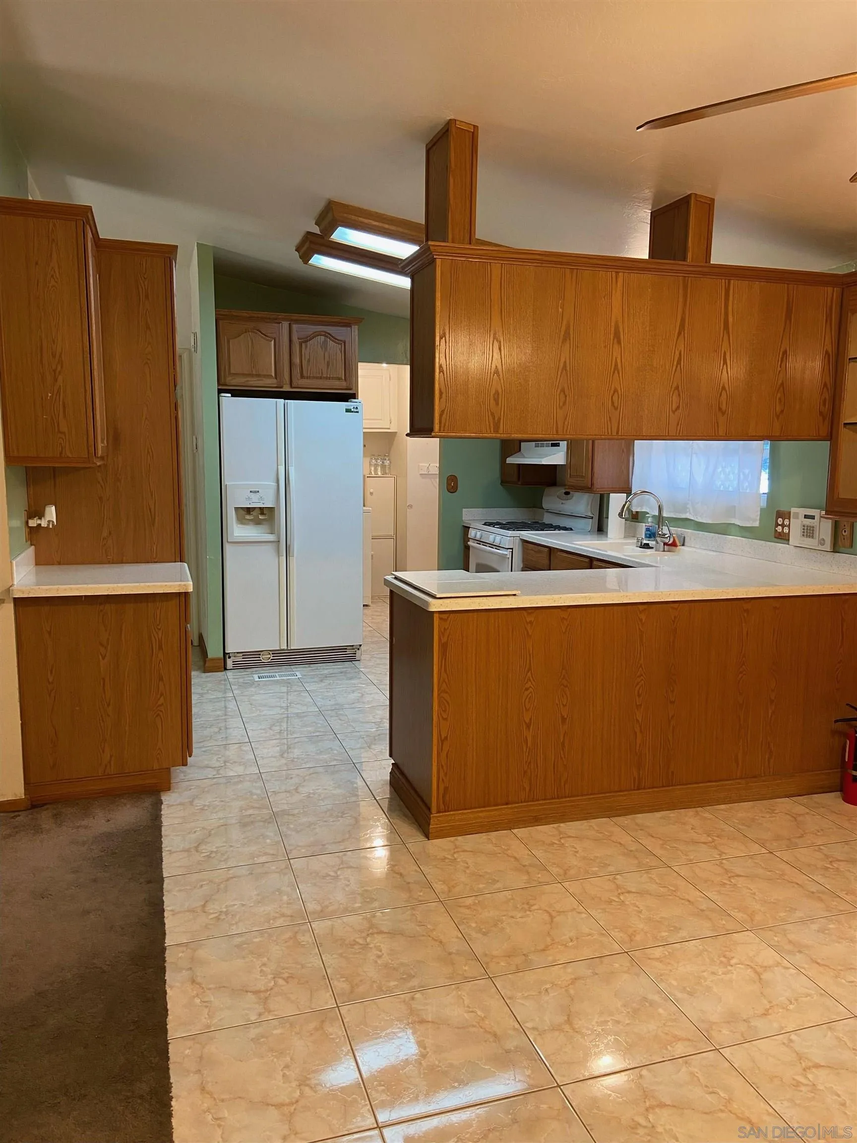 250 La Cresta Heights Road, Unit 18 El Cajon, CA 92021 - Photo 14 of 26 a view of a kitchen with a sink