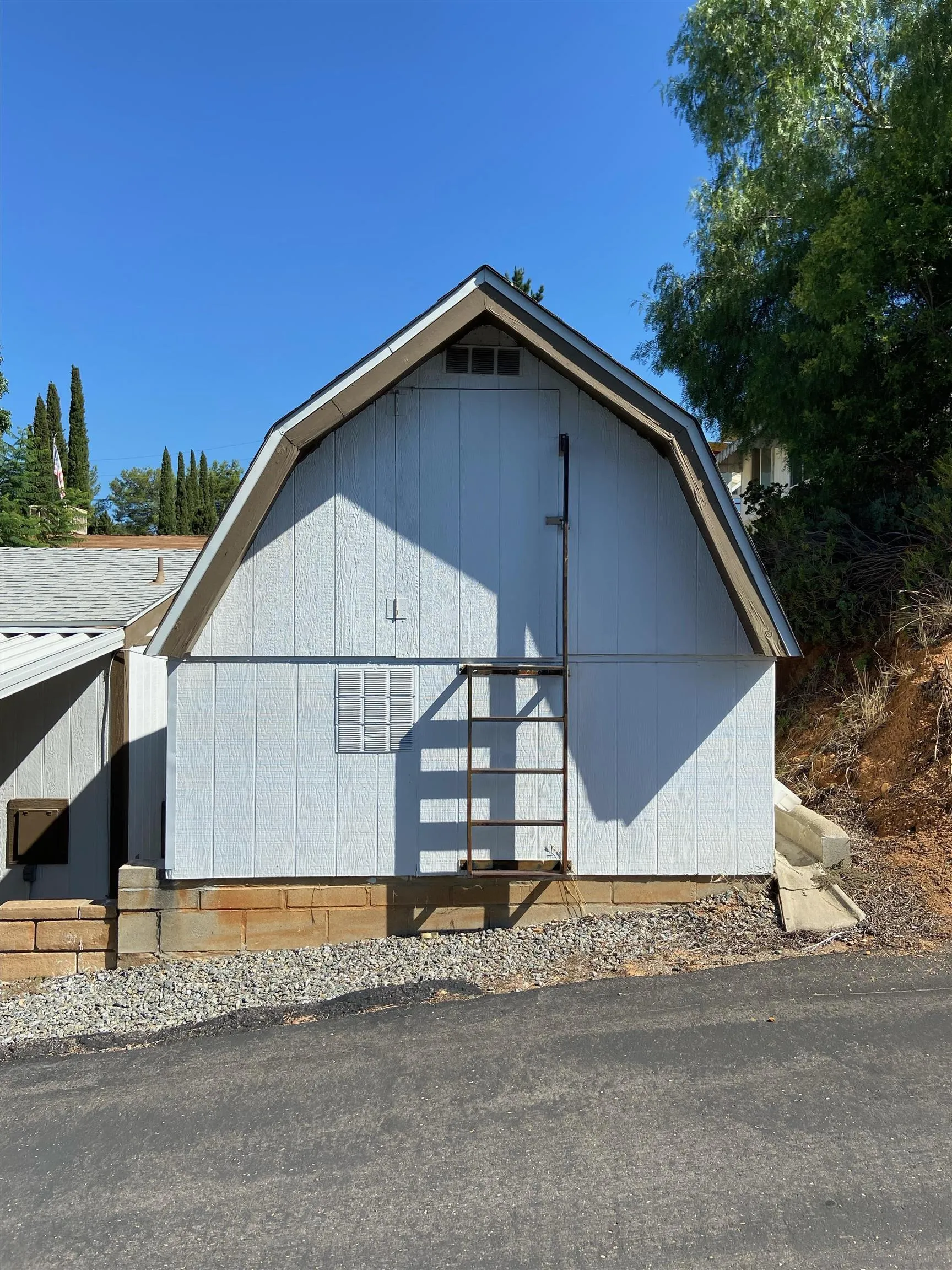 250 La Cresta Heights Road, Unit 18 El Cajon, CA 92021 - Photo 23 of 26 a view of a house with a yard