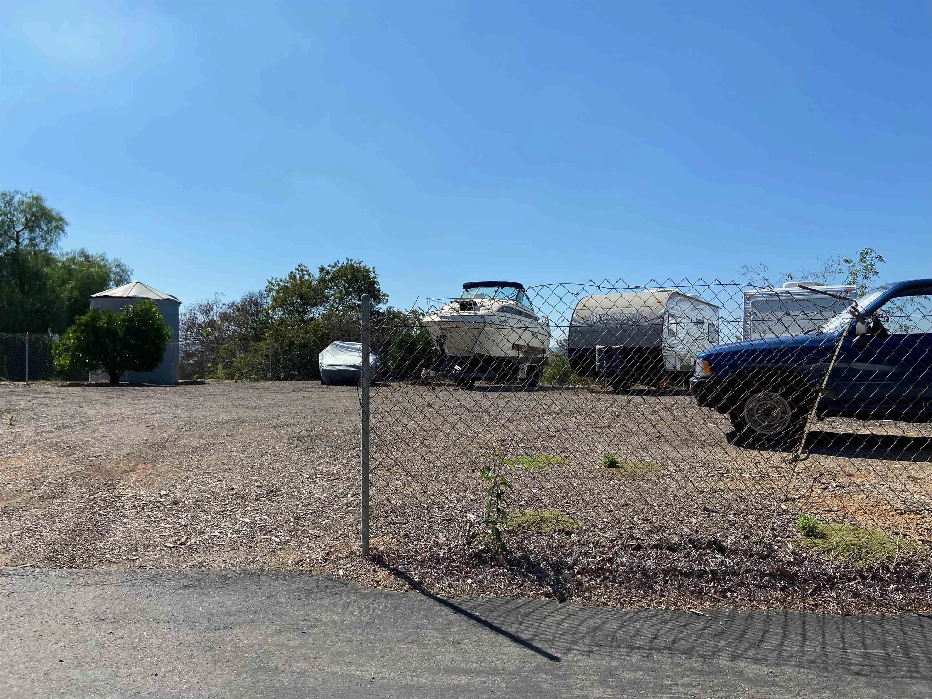 250 La Cresta Heights Road, Unit 18 El Cajon, CA 92021 - Photo 24 of 26 a backyard of a house with lots of green space