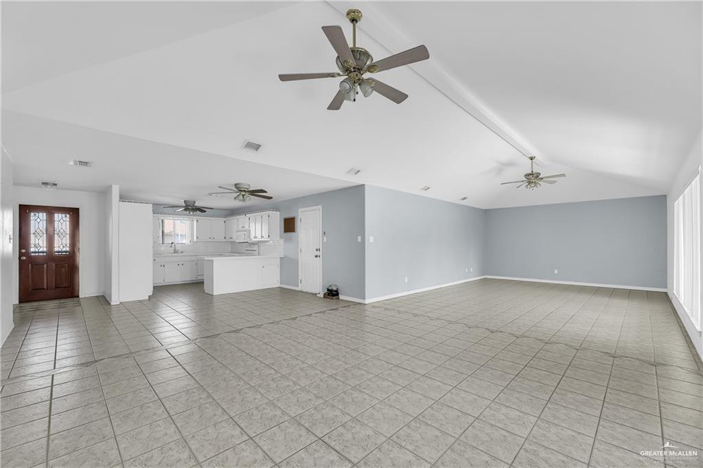 2002 Meadow Way Drive Mission, TX 78572 - Photo 3 of 20 a view of a livingroom with a ceiling fan and window