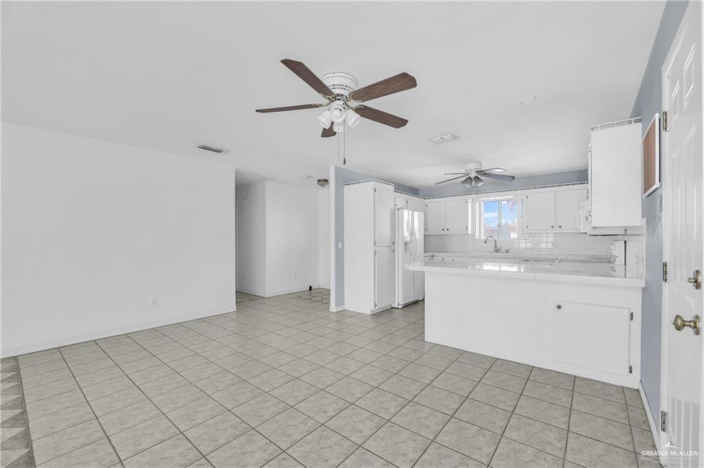 2002 Meadow Way Drive Mission, TX 78572 - Photo 6 of 20 a view of a kitchen with a sink