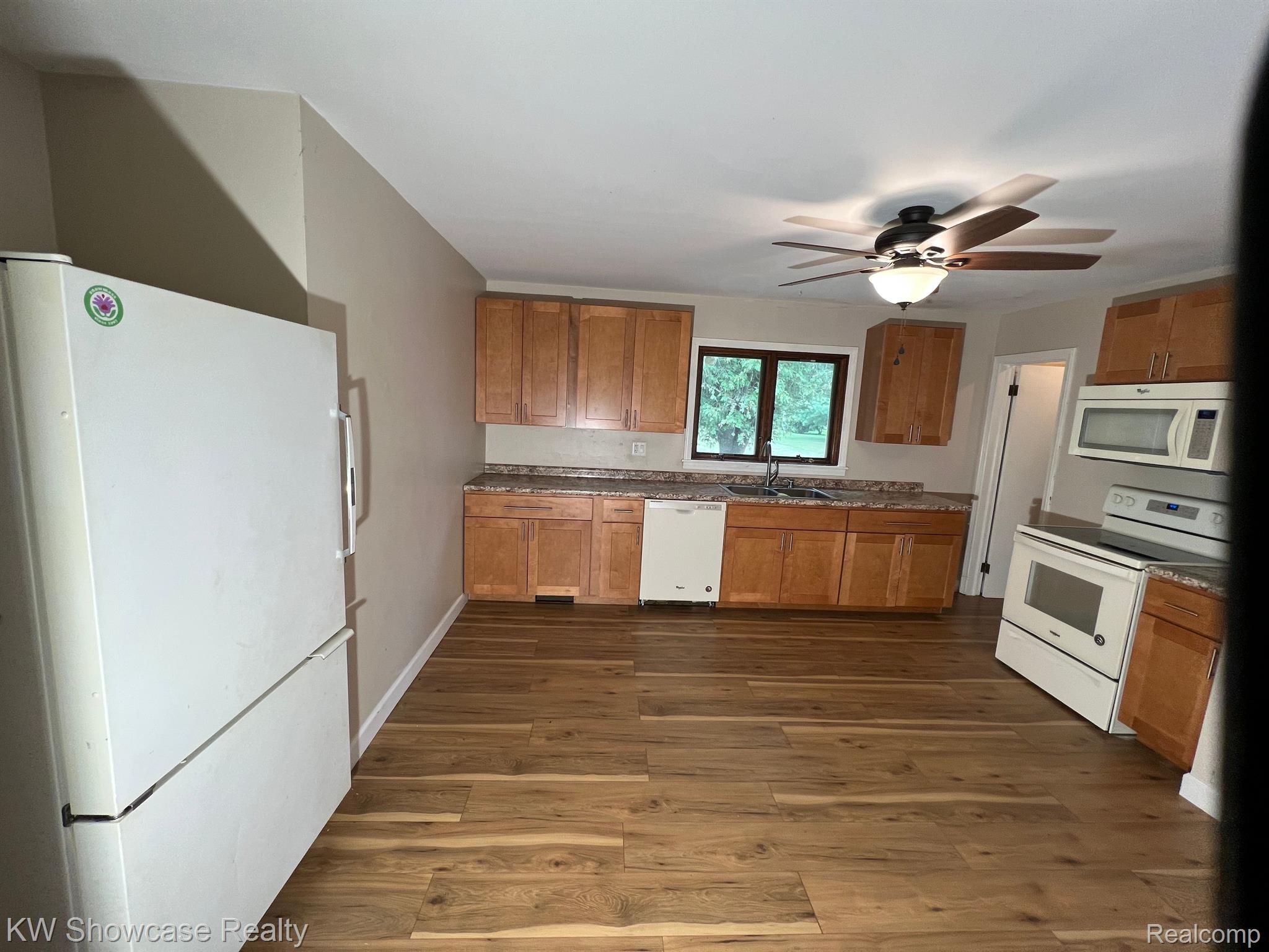 5958 Lakeshore Road Lexington, MI 48450 - Photo 11 of 21 Large kitchen with newer laminate floors