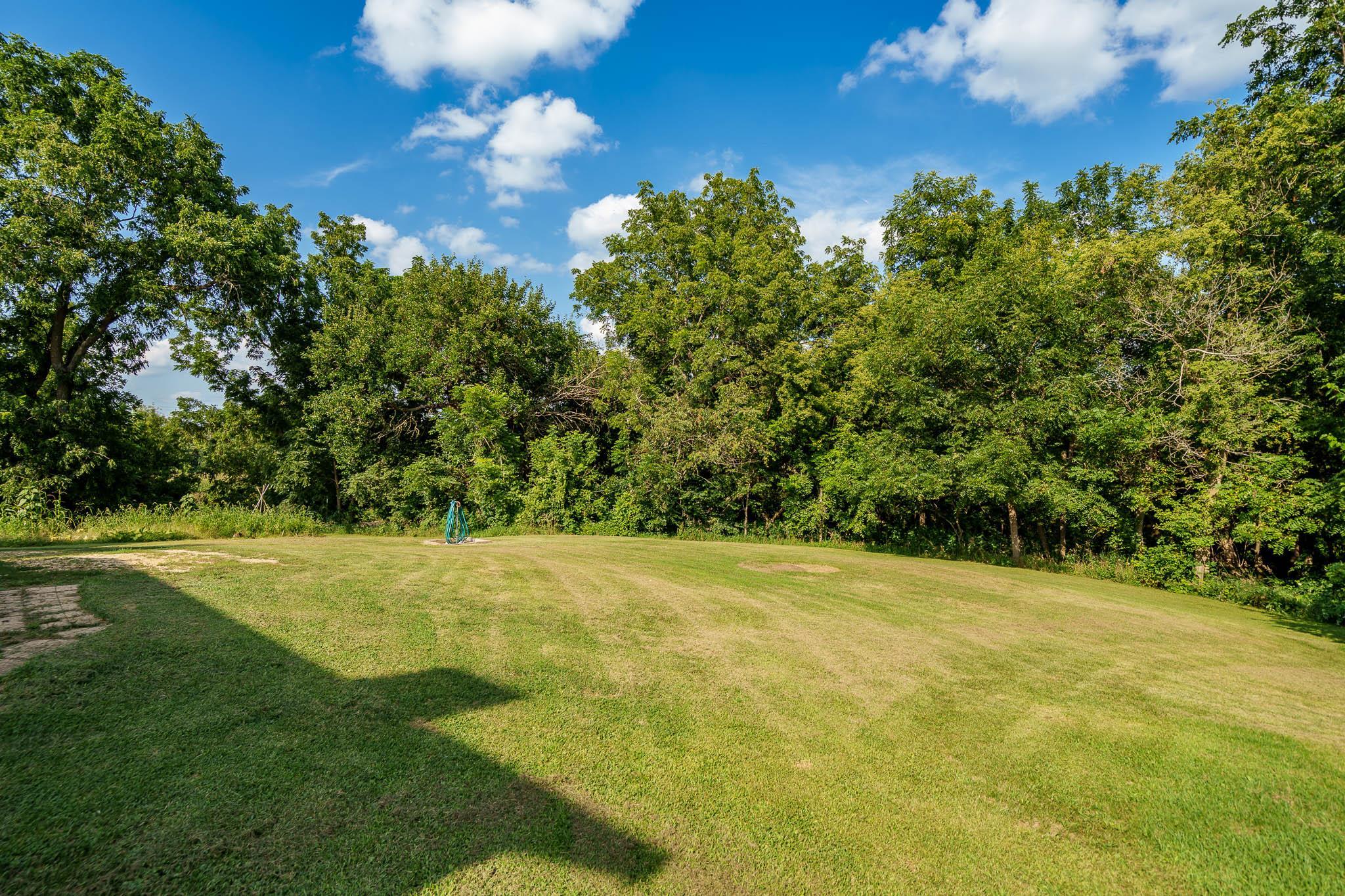 6913 West Wagner Road German Valley, IL 61039 - Photo 26 of 54 a view of a big yard with lots of green space