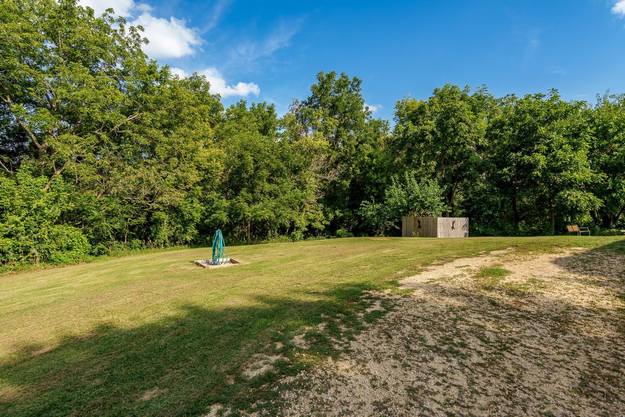 6913 West Wagner Road German Valley, IL 61039 - Photo 27 of 54 a view of a field with trees in the background