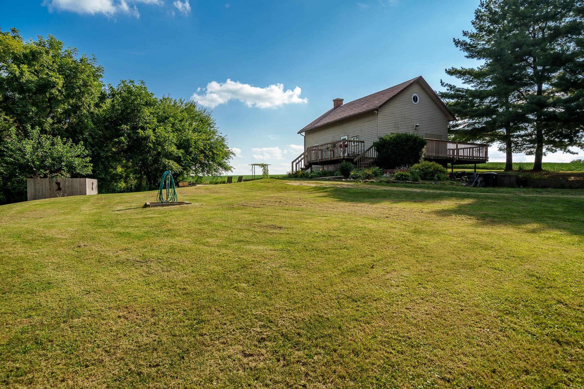 6913 West Wagner Road German Valley, IL 61039 - Photo 29 of 54 a house view with swimming pool in front of it