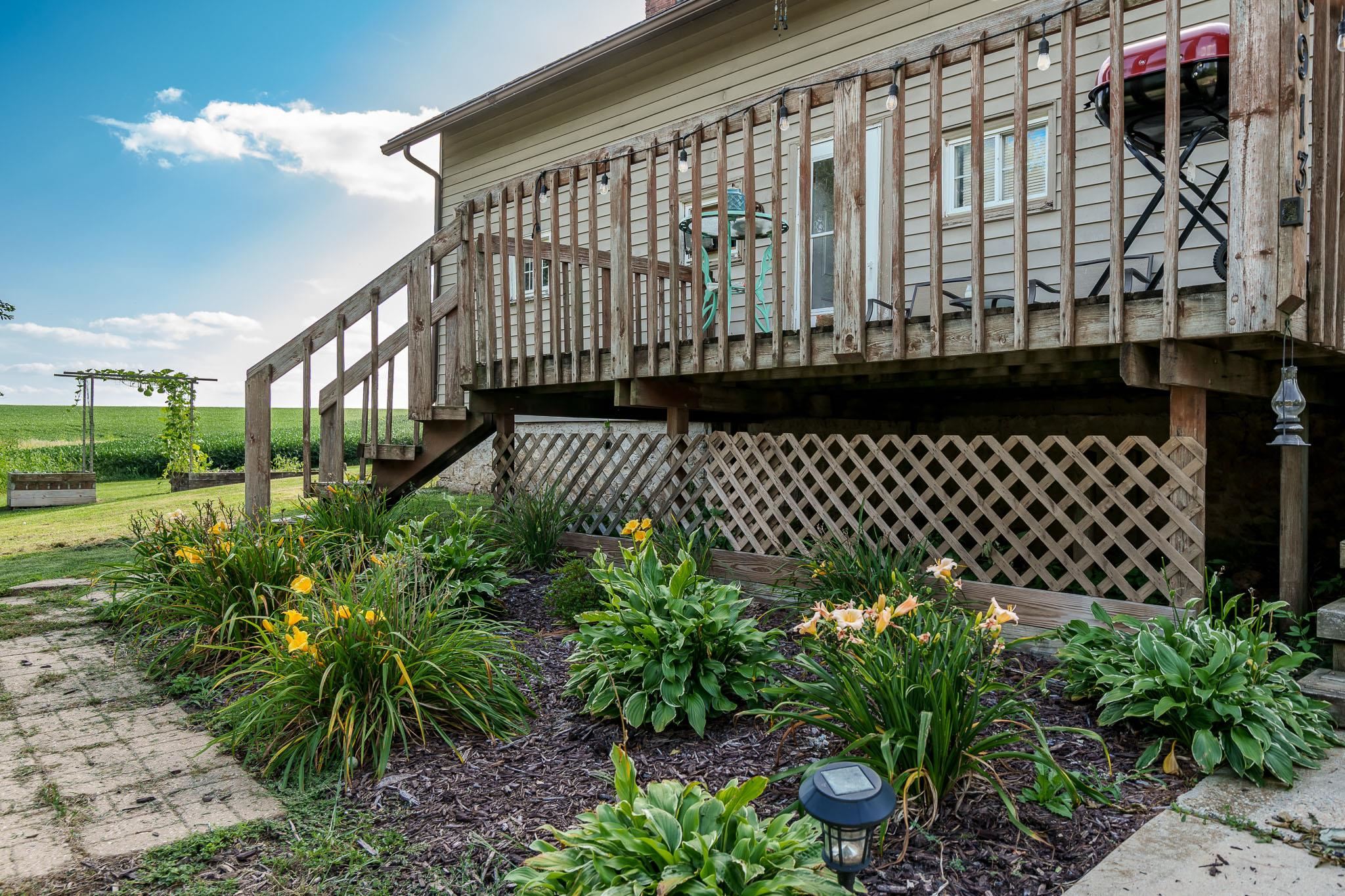 6913 West Wagner Road German Valley, IL 61039 - Photo 31 of 54 a view of a garden with a flower in a garden