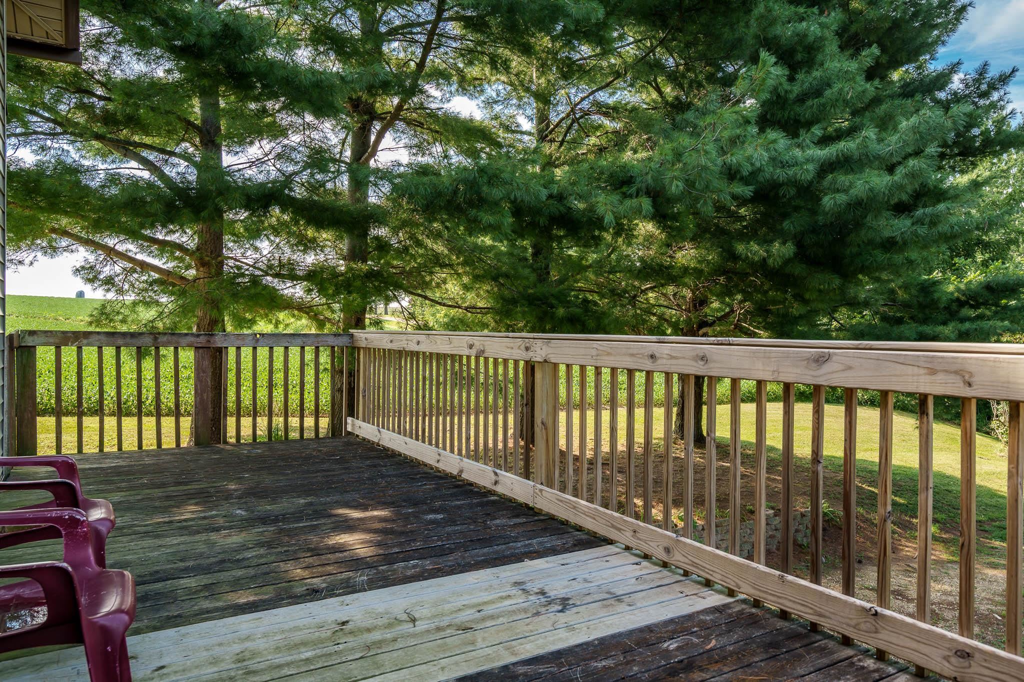 6913 West Wagner Road German Valley, IL 61039 - Photo 32 of 54 a balcony with a yard