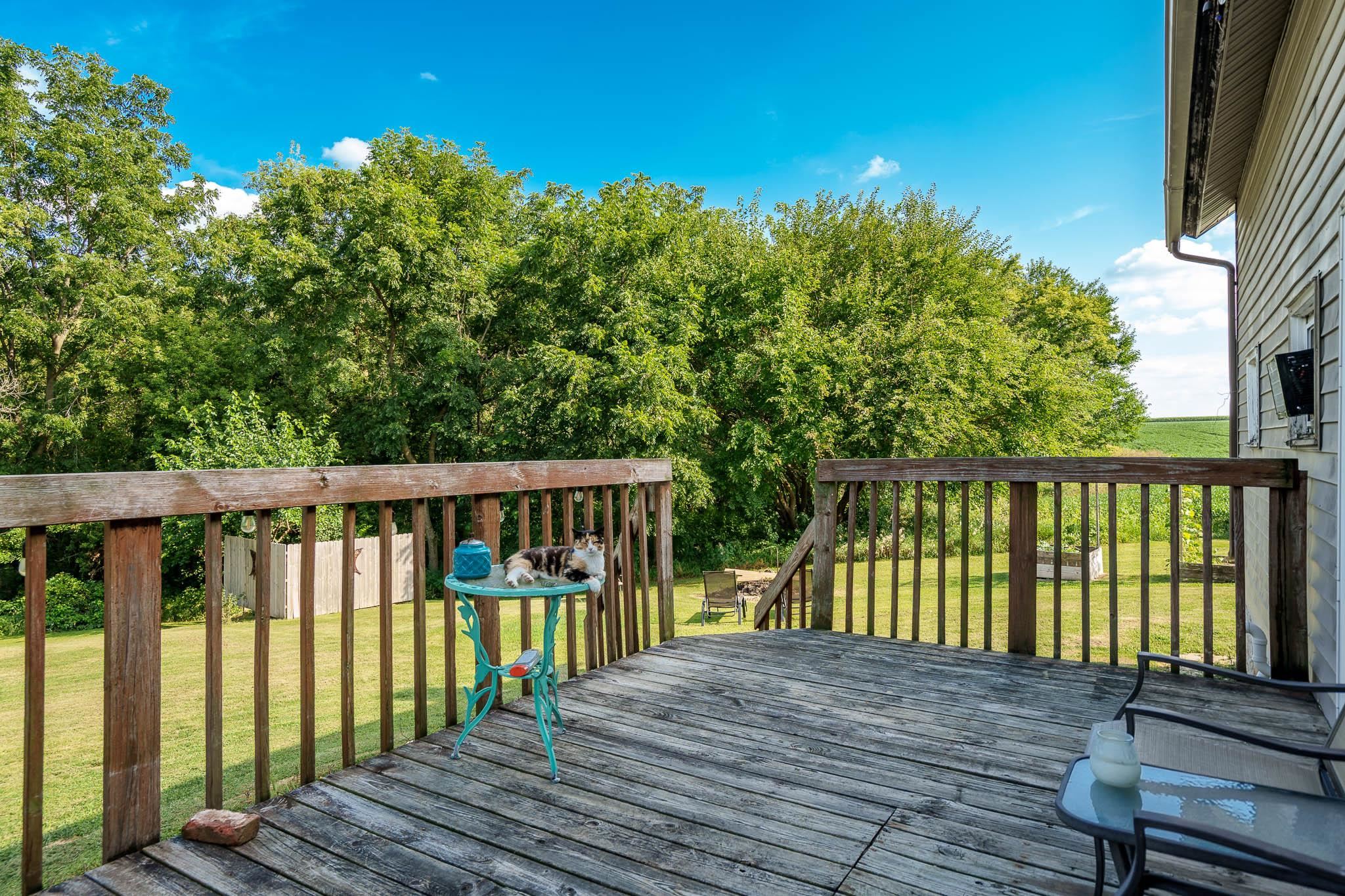 6913 West Wagner Road German Valley, IL 61039 - Photo 35 of 54 a view of balcony with wooden floor and fence