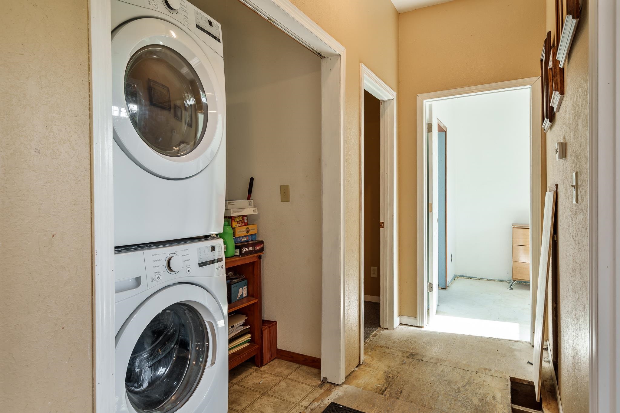 6913 West Wagner Road German Valley, IL 61039 - Photo 47 of 54 a view of a hallway with washer and dryer