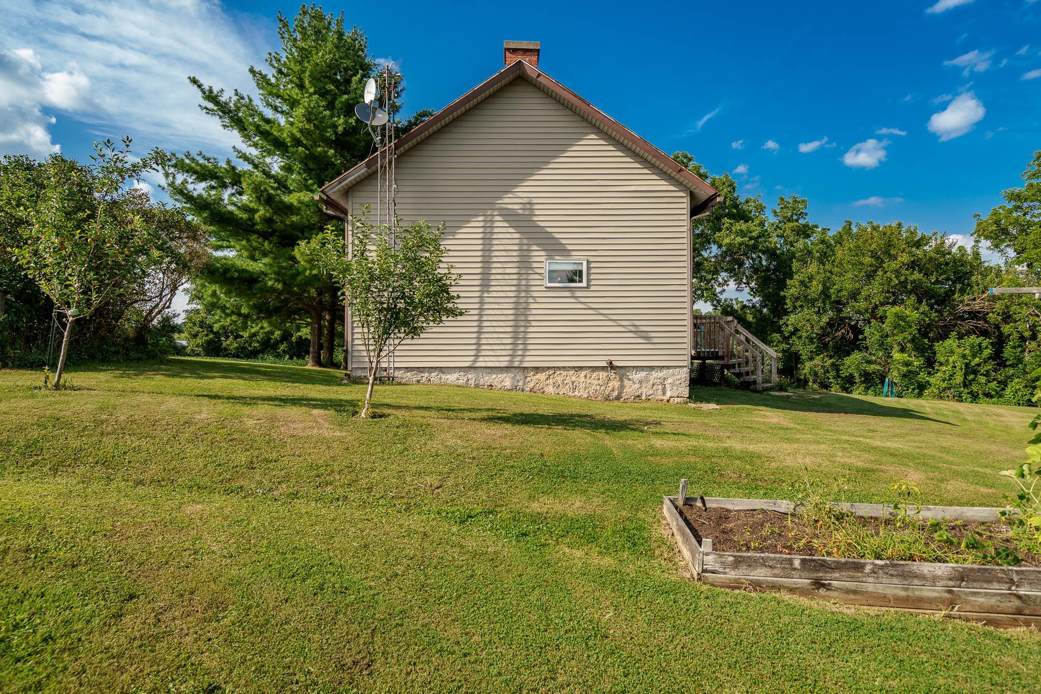 6913 West Wagner Road German Valley, IL 61039 - Photo 6 of 54 a view of a house with a yard
