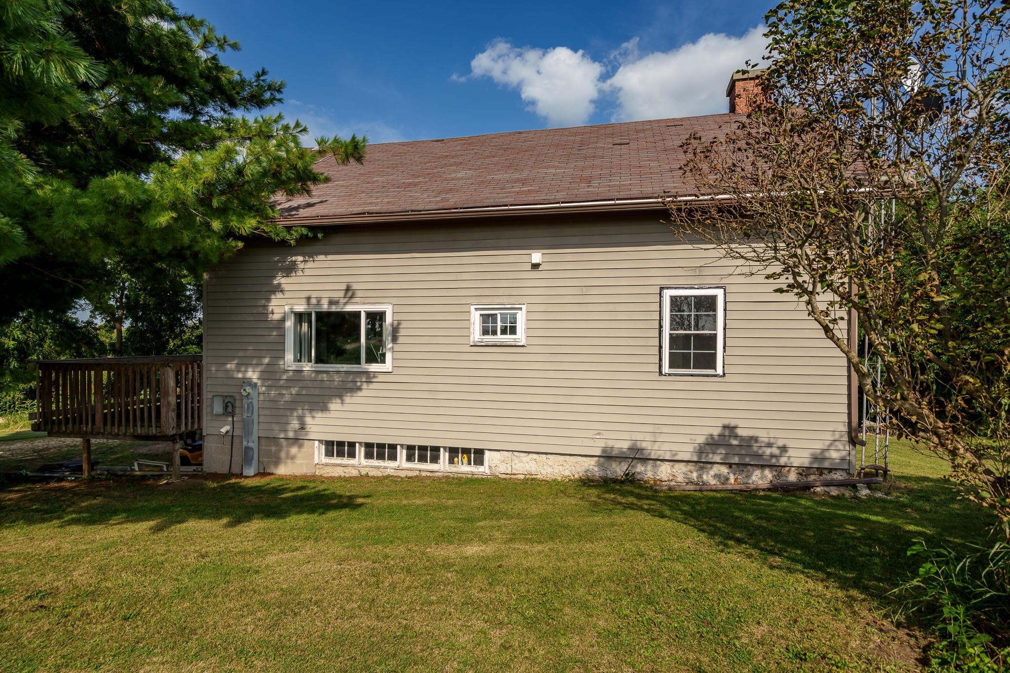 6913 West Wagner Road German Valley, IL 61039 - Photo 7 of 54 a view of a house with a yard