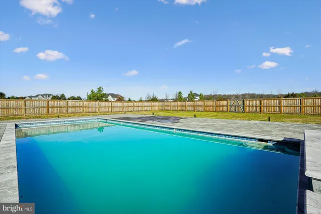 a view of an ocean with a city view