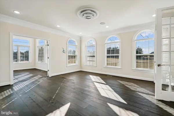 a view of balcony with wooden floor and city view