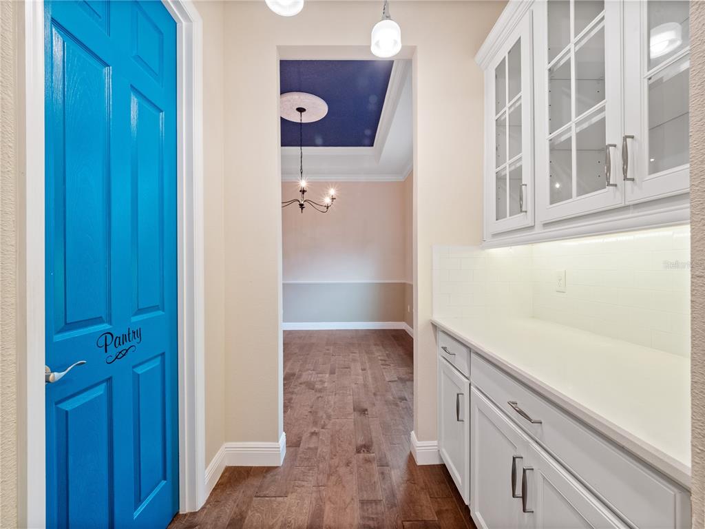 2922 Reef Knot Place Winter Park, FL 32792 - Photo 18 of 49 a view of a hallway with wooden floor