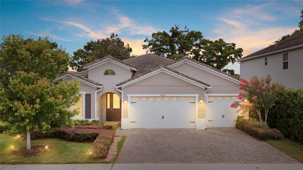 2922 Reef Knot Place Winter Park, FL 32792 - Photo 2 of 49 a view of a house with a yard and potted plants