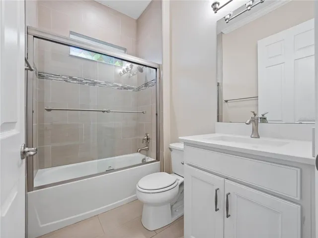 a room with a sink and a mirror