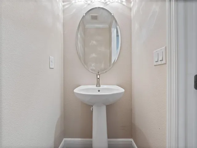 a view of a room with a large window