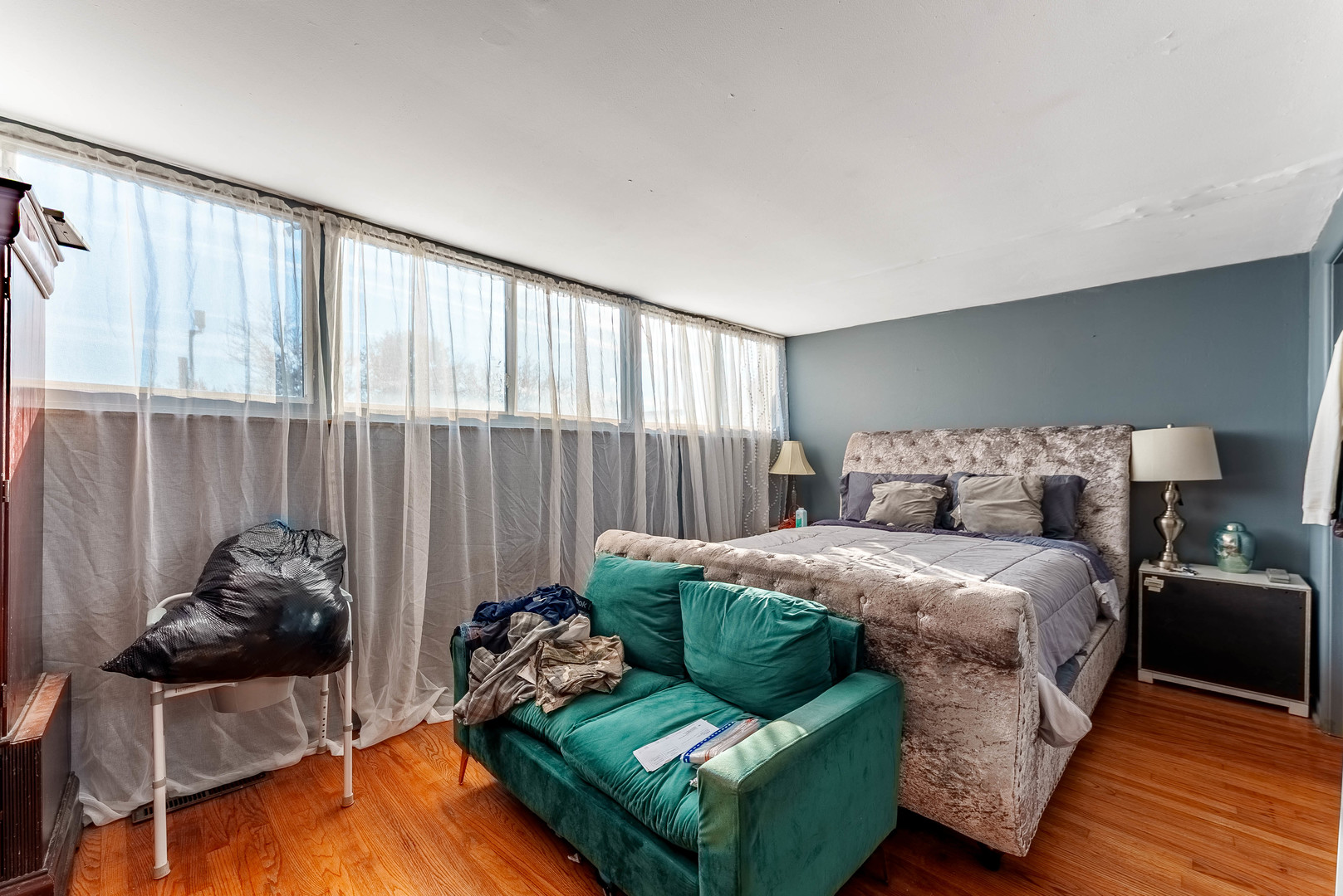 4148 West 19th Street Chicago, IL 60623 - Photo 17 of 21 a bedroom with a bed and a couch