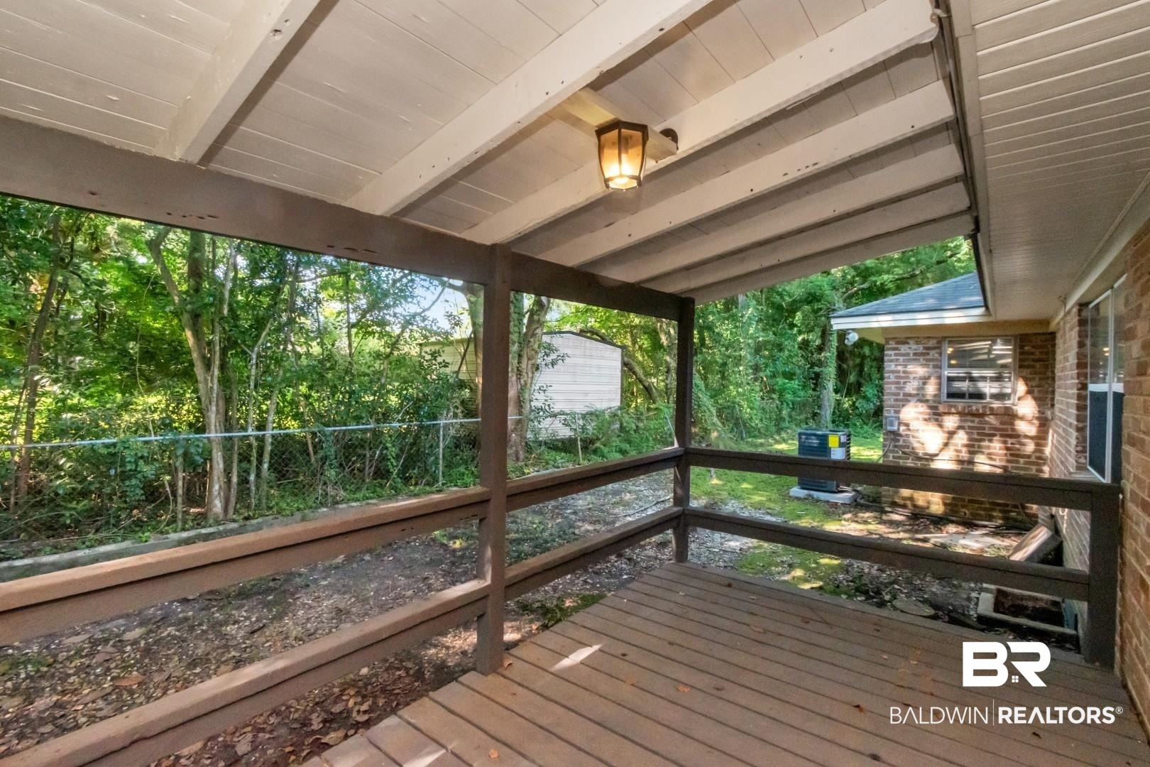 2105 Upham Court Mobile, AL 36607 - Photo 25 of 32 Wooden terrace featuring view of scattered trees