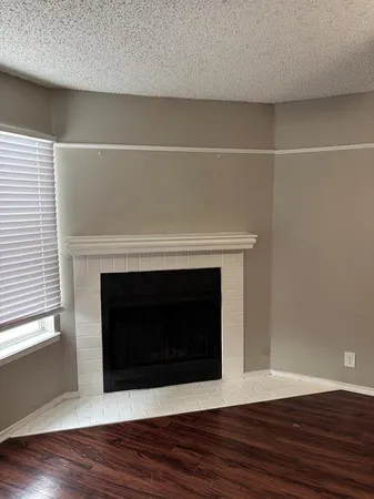 a living room with a fireplace