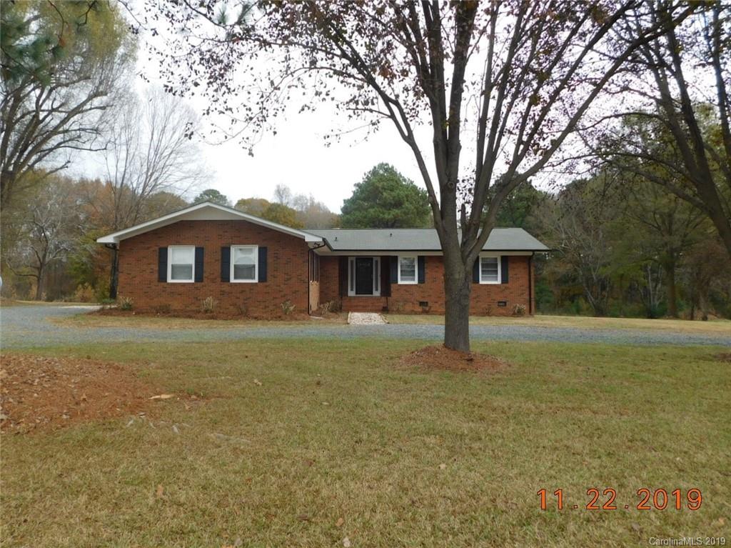 4020 Sincerity Road Monroe, NC 28110 - Photo 1 of 23 a front view of house with yard and green space