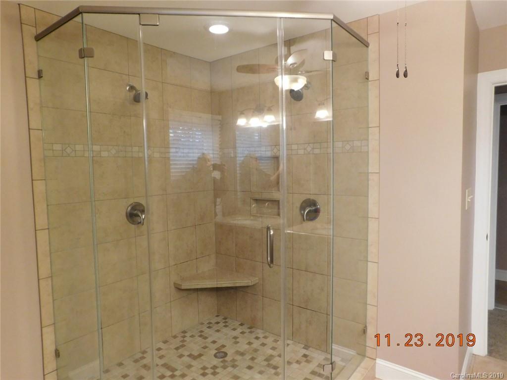 4020 Sincerity Road Monroe, NC 28110 - Photo 11 of 23 a bathroom with a shower