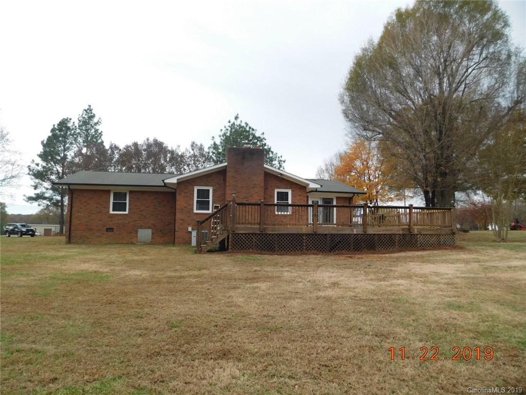 4020 Sincerity Road Monroe, NC 28110 - Photo 18 of 23 a front view of a house with a yard
