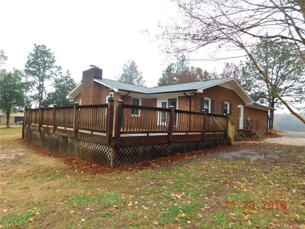 4020 Sincerity Road Monroe, NC 28110 - Photo 20 of 23 a view of a house with wooden fence in front of it