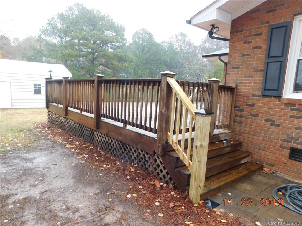 4020 Sincerity Road Monroe, NC 28110 - Photo 21 of 23 a view of stairs and wooden fence