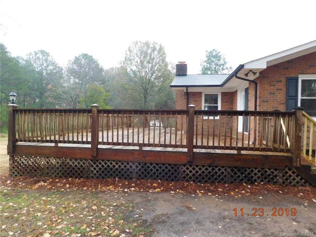 4020 Sincerity Road Monroe, NC 28110 - Photo 22 of 23 a front view of a house with a yard