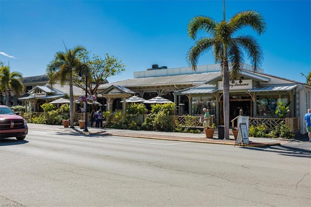780 10th Avenue South, Unit 24 Naples, FL 34102 - Photo 14 of 15 front view of a house with a street